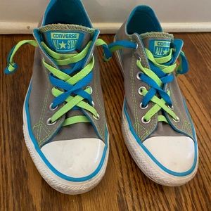 Women’s grey Converse with blue and green laces